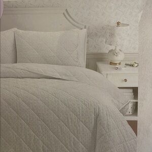 Elegant Floral Embroidered Quilted Bedding Set